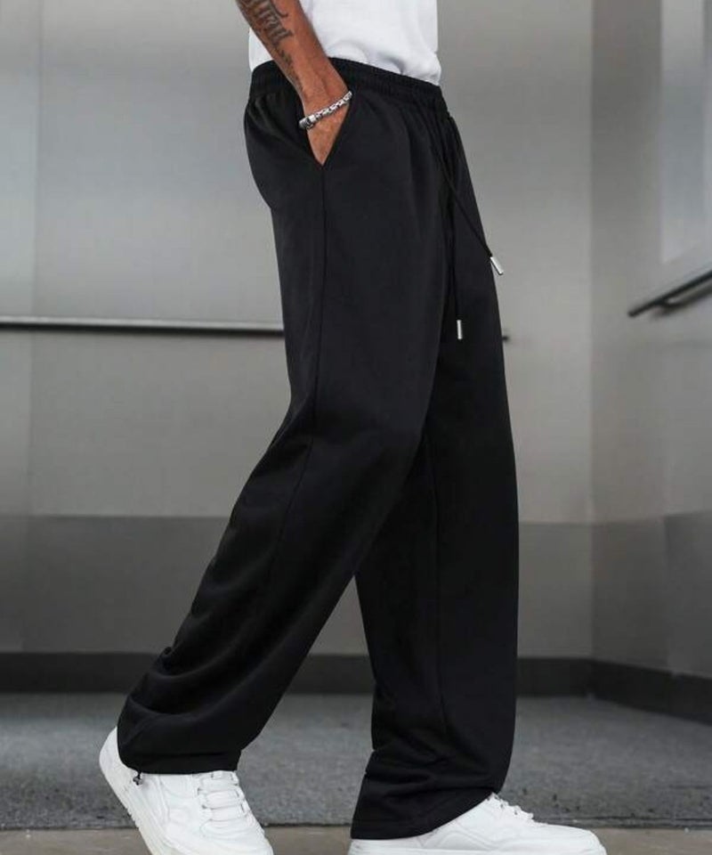 فلاينوف بنطال رياضي رجالي فاخر أسود سادة بقصة مريحة مع رباط للإغلاق وتصميم أنيق - Image 2